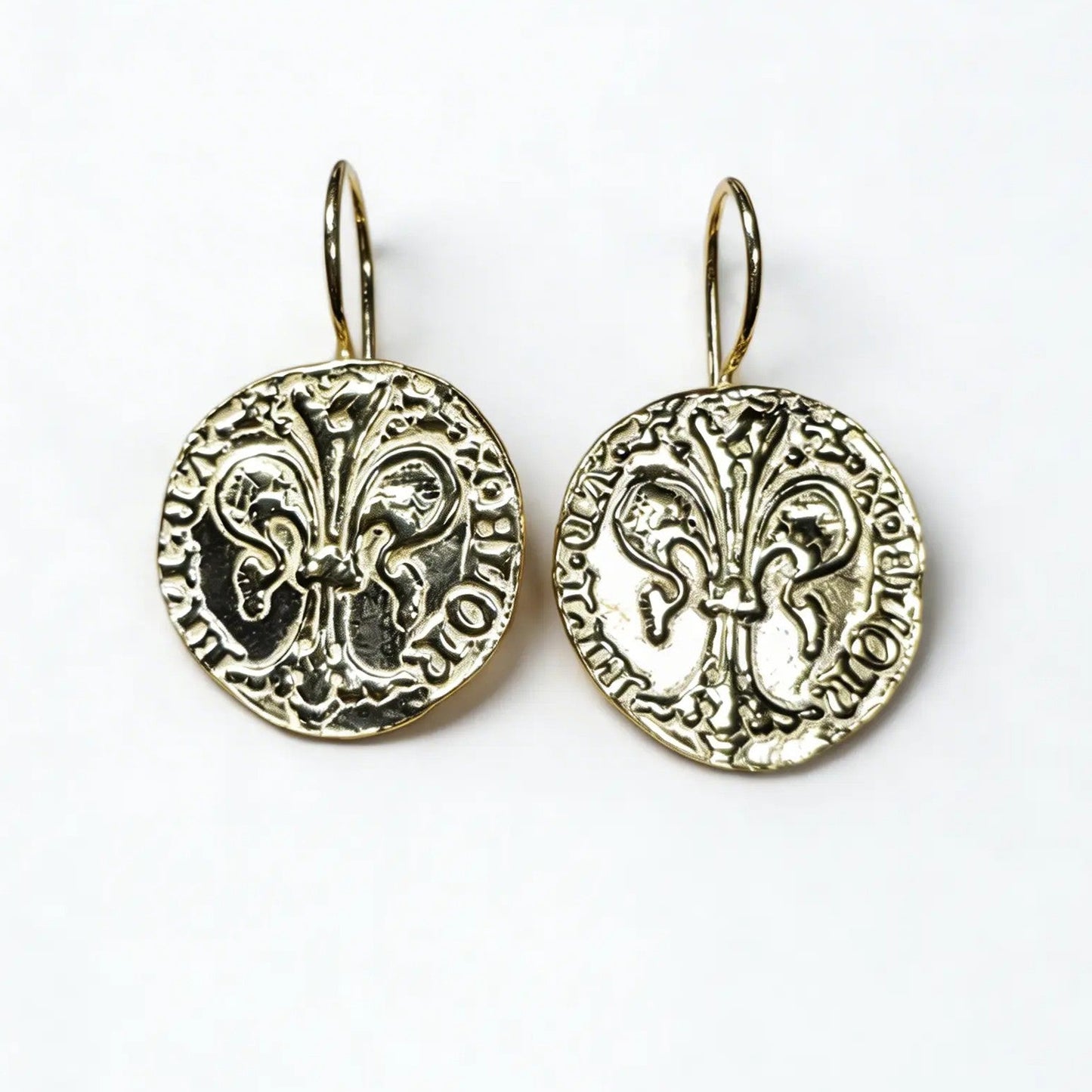 Florin coin earrings with a nun